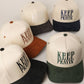 KEEP PRAYIN' Two-toned Suede Canvas Trucker Hat: OGN / One Size